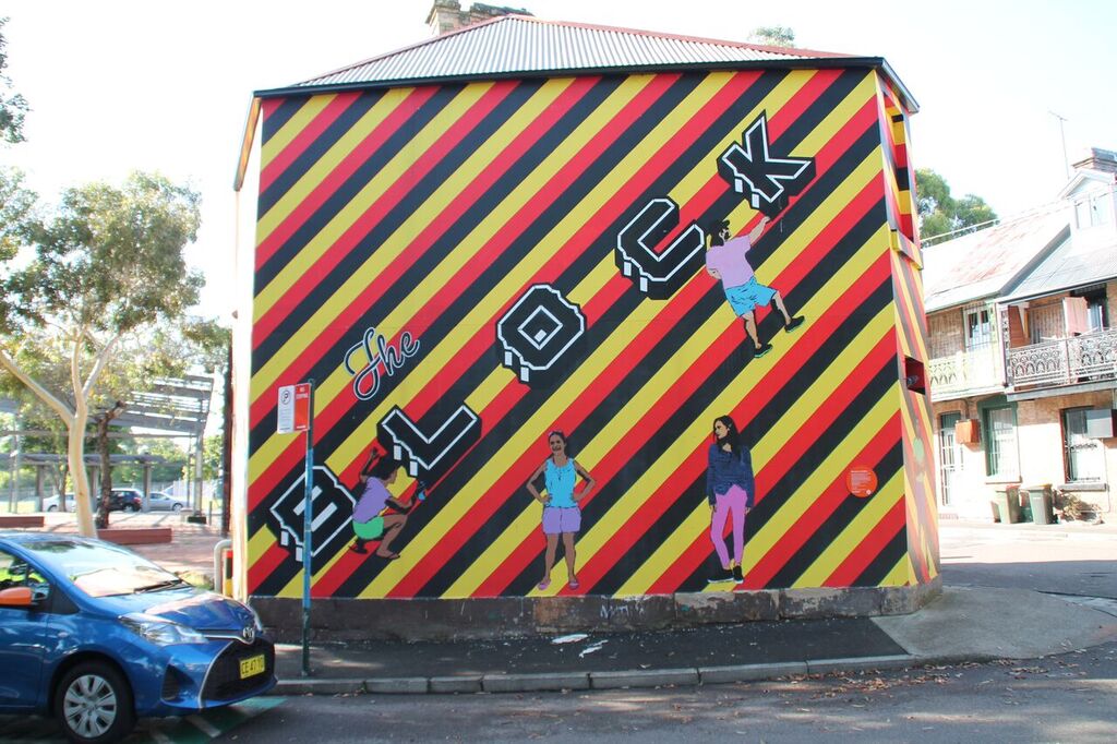 Prominent street art on Eveleigh Street, Redfern.